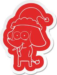 happy quirky cartoon  sticker of a elephant wearing santa hat