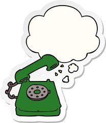 cartoon old telephone with thought bubble as a printed sticker