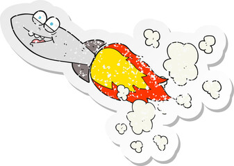 retro distressed sticker of a cartoon missile