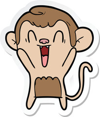 sticker of a cartoon laughing monkey