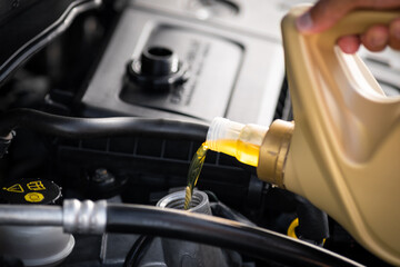 Pouring engine oil