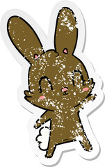 distressed sticker of a cute cartoon rabbit