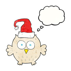 freehand drawn thought bubble textured cartoon owl wearing christmas hat