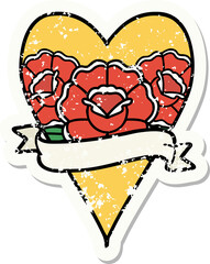 distressed sticker tattoo in traditional style of a heart and banner with flowers