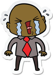 sticker of a cartoon crying bald man