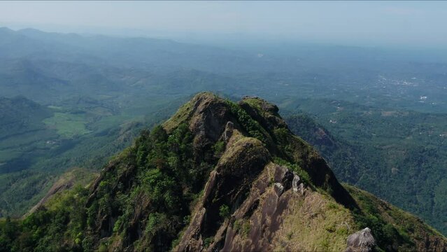 Illikkal Kallu is a major Indian tourist attraction spot in Moonnilavu village of Meenachil taluk in the eastern Kottayam district of the state of Kerala, India