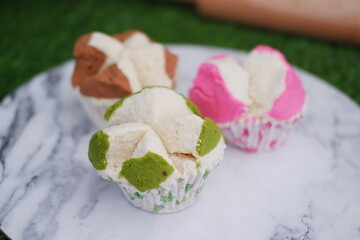 Bolu kukus is an Indonesian traditional sponge cupcake - obrazy, fototapety, plakaty