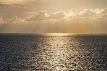 Sunrise, sunset over the horizon of the Caribbean Sea, the Bahamas, and the North Atlantic Ocean