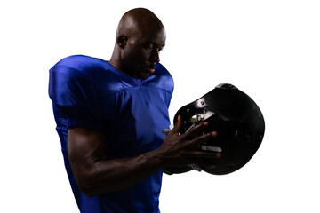 Digital png photo of african american rugby player holding helmet on transparent background