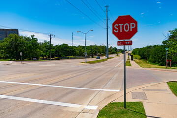 road sign of all way stop. caution red roadsign. traffic sign on the road. attention caution road...