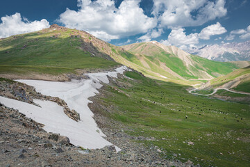 Glacier on mountain pass in Kyrgyzstan before Lake Song-Kul (Song-Kol). Height approx. 3500 meters above sea level. The Tian Shan mountains.