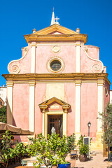 View at the Church of Santa Maria in the streets of Calvi town in Corsica - France