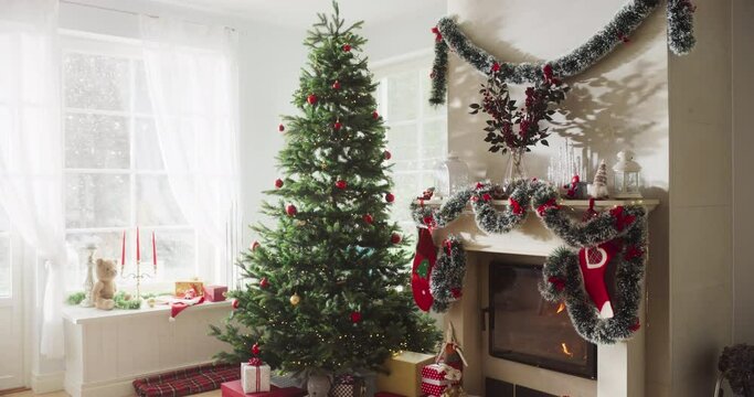 Empty Shot Depicting the Magic of Holidays on a Peaceful Snowy Christmas Morning: Decorated Corner in Modern House with Christmas Tree, Fireplace and Gifts. Home of a Family Celebrating with Joy
