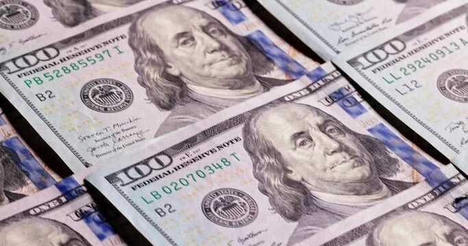 One hundred dollar money printing process. Money printing, state issue of money, cash, us bills, usd. Close-up finance currency cash background business bank print concept money banknote bill. 
