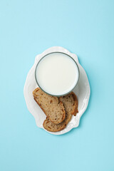 Breakfast tasty food concept - milk with bakery products