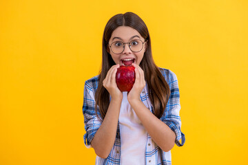 Biting apple concept. Healthy apple fruit. natural vitamin for teen girl. teen child with apple. healthy food. teen girl eating apple. girl has breakfast with vitamin. dieting and vegan. Fresh fruit - obrazy, fototapety, plakaty