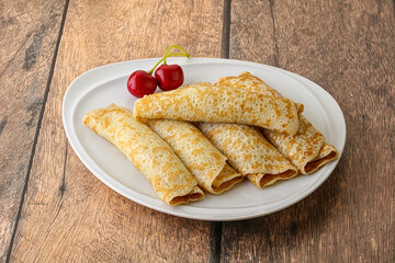 Sweet and tasty pancake with cherry