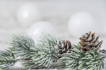 Fototapeta na wymiar Christmas decoration with fir branch, pine cone and balls
