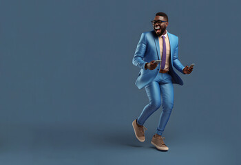Fototapeta na wymiar A young successful man, a businessman, in full growth, dressed in a blue suit, moves with a mobile phone in his hand, isolated on a blue background.