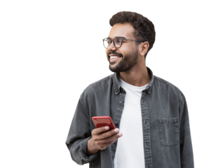 Young handsome man using smartphone isolated transparent PNG. Smiling student men with mobile phone looking away to copy space isolated portrait. Modern lifestyle, connection, business concept