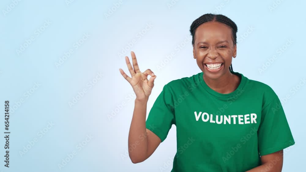 Poster Woman thinking, volunteer and pointing to space in studio for presentation, information and sign up or okay advertising. Face of african person for volunteering idea, NGO support on a blue background