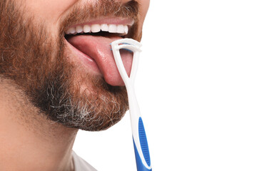 Man brushing his tongue with cleaner on white background, closeup - obrazy, fototapety, plakaty