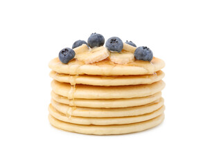 Fototapeta na wymiar Delicious pancakes with banana slices, blueberries and honey isolated on white