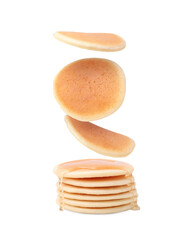 Many tasty fresh pancakes falling on white background