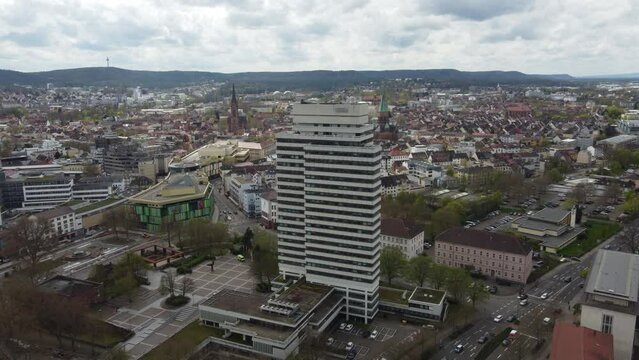 Aerial cityscape of Downtown Kaiserslautern city traffic with its town hall and shopping mall, Germany