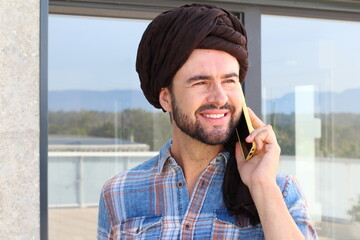 South Asian man on the phone 