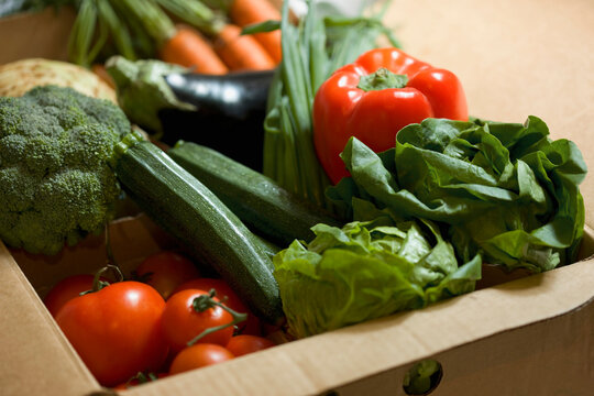 Close up of a box full of organic vegetables
