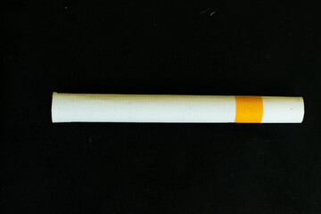 Close up cigarette handmade isolated on black background