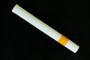 Close up cigarette handmade isolated on black background
