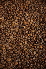 Roasted coffee beans background. Close-up of coffee beans