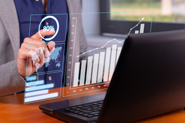 Successful Business Trends: Businessman Analyzing Rising Graphs in Modern Office
