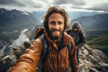 Normate man travel, climb mountains and take selfies photo