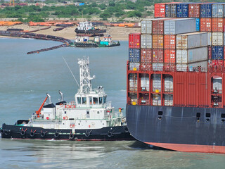 Tugboat during mooring operation in port 