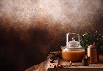 Foto op Plexiglas traditional masala tea with spices © Olga Kriger