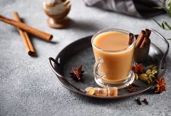 Foto op Plexiglas traditional masala tea with spices © Olga Kriger