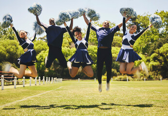 Cheerleader team portrait, people and jump for performance on field outdoor in training,...