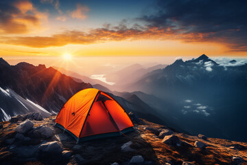 Tent standing on top of a mountain during sunset, landscape view, camping on top of a mountain