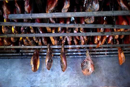 Traditional Montenegrin pork ham prshut is prepared in a smoke house