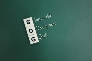 the letters of the SDG alphabet or the word Sustainable Development Goals. eradicate poverty and realize a sustainable world.