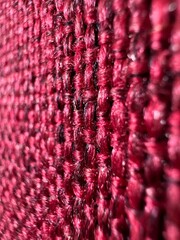 Jute fabric simple woven texture may used as background Christmas red decorative fabric	