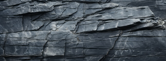 a close up of a rock wall in the style of dark sky-blue and light gray