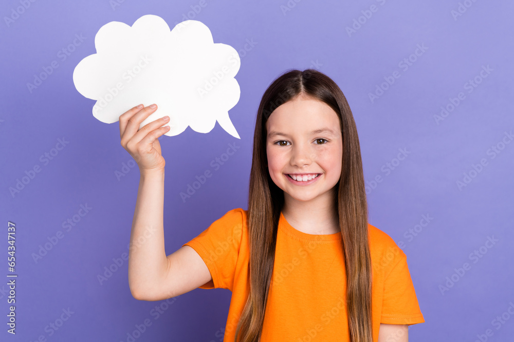 Poster photo of cheerful schoolgirl holding paper bubble cloud creative idea dreams chatterbox speech isola