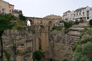 Photo sur Plexiglas Ronda Pont Neuf Puente Nuevo, the new bridge of Ronda in Andalucia, spanning over the gorge of the El Tajo