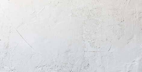 Close up of texture white putty or plaster on the wall, creating a smooth and clean surface for interior finishing.