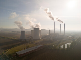 aerial view of coal fired power station and Combined cycle power plant at sunrise, Pocerady, Czech republic