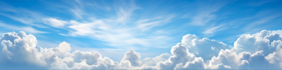 Clear Blue Sky - panoramic view with vibrant sunlight and tropical clouds